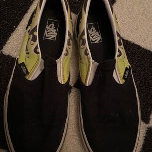 Yellow-green drip black vans off the wall